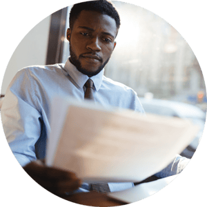 black man reading documents circle